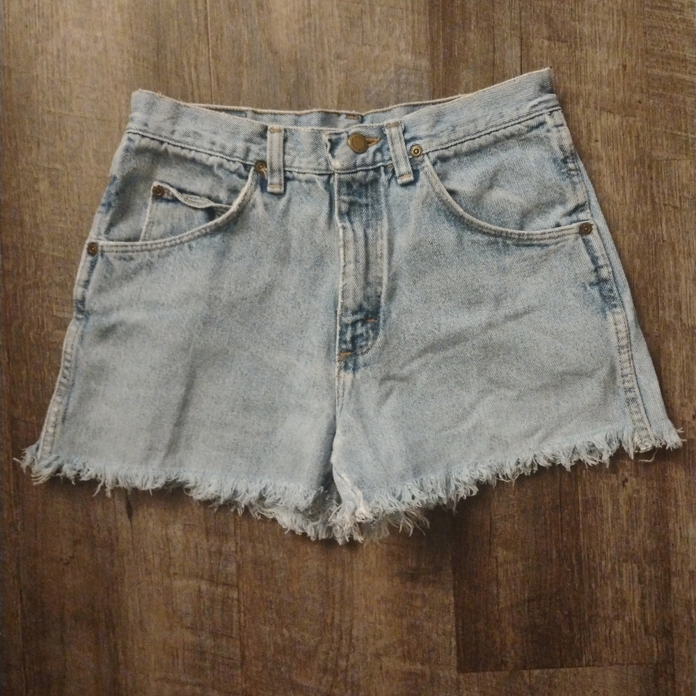 Vintage Wrangler slightly distressed high waisted light wash jeans